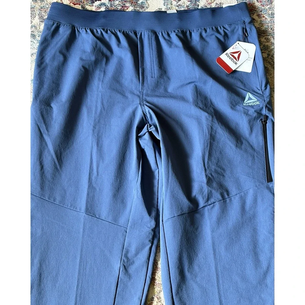 New Reebok Ascent Woven Jogger Pants Dark Denim 2XL Slim Hiking Outdoors Stretch